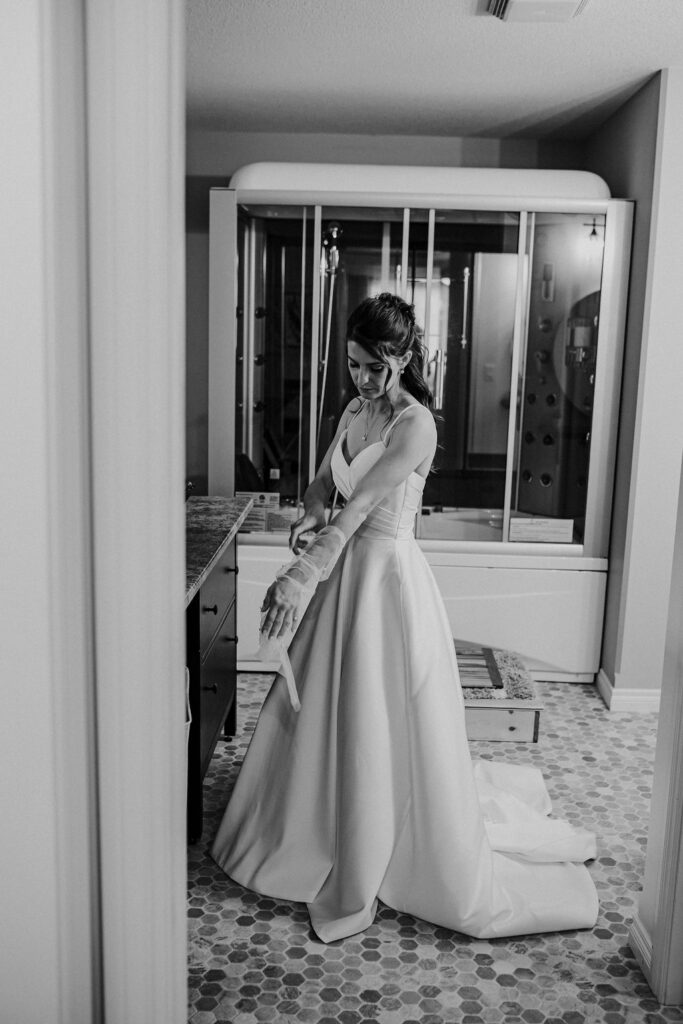 bride getting ready alberta wedding photographer