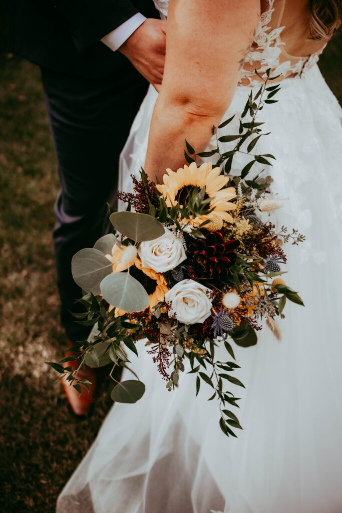 Wedding detail photography Red Deer Alberta — rings and florals by Calgary wedding photographer Leah Tyler-Szucki